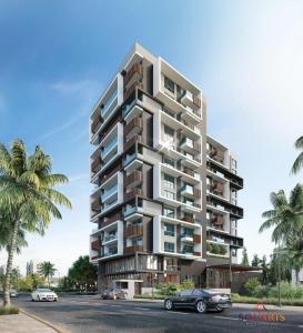 an architectural rendering of a tall apartment building at Solaris in Christiansborg