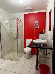 a bathroom with a toilet and a shower and a sink at Avoca Park Equestrian Farmstay in Macclesfield +67 photos