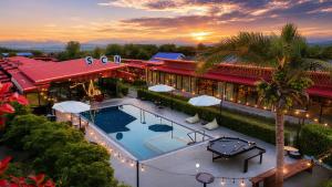 an overhead view of a hotel with a swimming pool at Wellness Resort Rayong Managed by SCN in Ban Huai Pla Kang