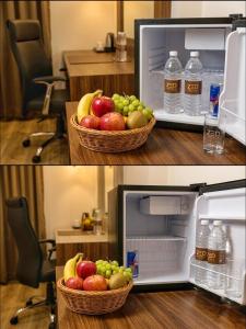 two pictures of an open refrigerator with a basket of fruit at ZED Plaza in New Delhi