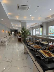 a buffet line with many different types of food at Anita Matiate Hotel in Beldibi