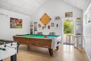 a billiard room with a pool table in it at 0498-Romo-Godthabsvej-29 in Høm