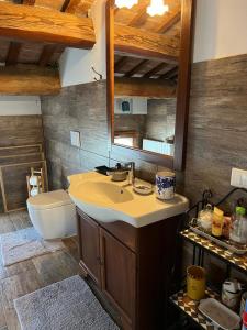 a bathroom with a sink and a toilet at B&B Il Castello di Alberico in Cotignola +58 photos