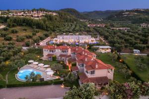 an aerial view of a house with a swimming pool at Kassandra Villas in Hanioti