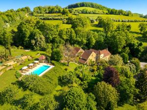 an aerial view of a estate with a swimming pool at Clos de Fougères - La Grange 6-7 personnes in Montoillot