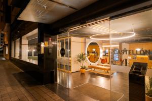 a display window of a furniture store with a couch at B&B HOTEL Castellón in Castellón de la Plana