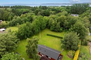 an aerial view of a house with a large yard at LF14218-Roslev-Skovsovej-4 in Roslev
