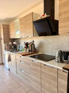 a kitchen with a sink and a counter top at Domaine d'Equital'Or in Cressanges