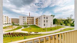 a view of a building with a courtyard at Candy 3 in Trnava