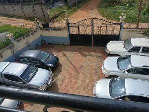 a group of cars parked in a parking lot at Amidez Apparts in Zalom