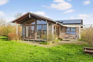 a house with solar panels on top of it at LF241-Snedsted-Kongens-Borer-10 in Snedsted