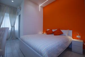 Ein Bett oder Betten in einem Zimmer der Unterkunft B&B Il Porto