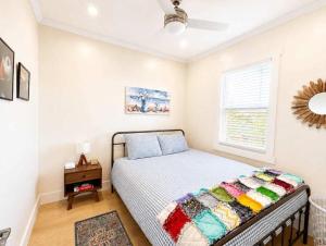 a bedroom with a bed and a window at Wild Cove Nook in Twillingate +5 photos