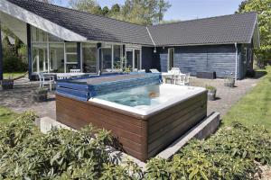 a hot tub in the backyard of a house at 13328-Vig-Lillemosevej-5 in Vig