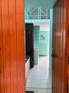 an open door to a kitchen with a hallway at Domus Lucrezia in Bisceglie