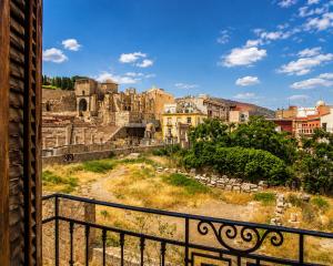 a view of a city from a balcony at Apartamentos Turísticos Teatro Romano by CartagenaSpain in Cartagena