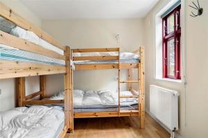 a bedroom with two bunk beds in a room at LF13030-Karby-Agerovej-44 in Karby