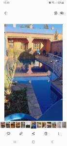 a picture of a house with a swimming pool at Kasbah Petit Nomade in Tinerhir