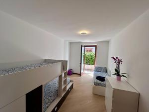 a living room with a couch and a fireplace at Rosa dei Venti - Como Lake House in Valmadrera +22 photos
