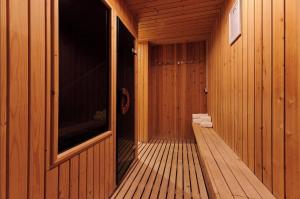 a wooden cabin with a sauna with wooden walls at Hotel ROC Oberoy - Adults Only in Paguera