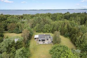 an aerial view of a large house in the woods at LF15319-Hojslev-Jelsevej-319 in Højslev