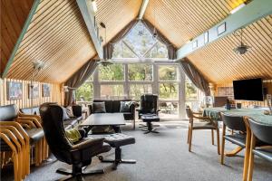 a large room with a lot of chairs and tables at 0142-Romo-Ivigtut-1 in Høm