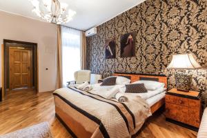 Posteľ alebo postele v izbe v ubytovaní Aparthotel Oberża