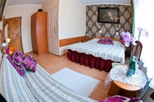 Łóżko lub łóżka w pokoju w obiekcie Victoria Rooms