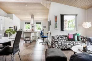 a living room with a couch and a table at LF271-Vestervig-Gunhildsvej-49 in Vestervig