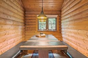 a wooden room with a long table in it at LF14362-Roslev-Nautrupvej-62 in Roslev +16 photos