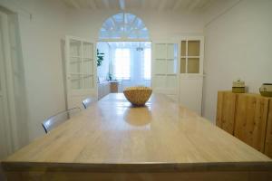 a dining room table with a bowl on top of it at Le cocoon de Pome et Leon in Perpignan +59 photos