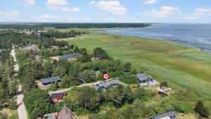 an aerial view of a house next to the ocean at 0259-Romo-Lyngvejen-89-B in Høm