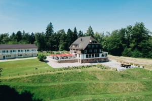 an aerial view of a large house on a field at EDELFUCHS Rote-Lache in Forbach