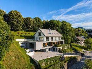 an aerial view of a house on a hill at Vila Katarina - Lake View Apartments in Bled