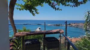 a view of the ocean from a balcony at OLYMPIADA View in Pythagoreio