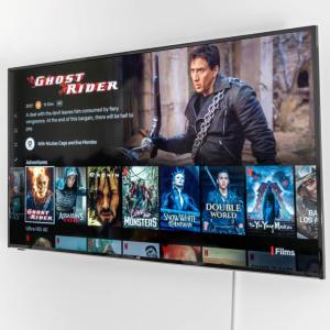 a tv screen with a bunch of movies on it at Modern 3 Bed Townhouse - Wolverhampton Centre - Gated Development - Bedroom TV 1CO in Wolverhampton