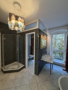 a bathroom with a shower and a sink at Apartmenthaus Albrechtsburg in Bad Schandau +59 photos