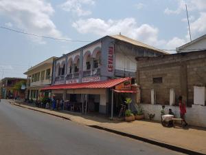 a building on the side of a street at Le Valiha Hotel in Antsiranana