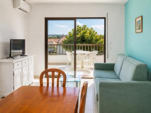 a living room with a table and a couch at TARONGERS 7 in Peniscola