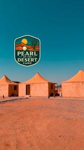 a sign for a peanut desert camp in the desert at Pearl of the desert camp in Wadi Rum