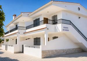 a white house with a staircase at TARONGERS 7 in Peniscola
