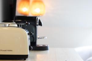 a toaster sitting on top of a kitchen counter at Cozy apartment with a great location at "Residentie GAUGUIN" in Nieuwpoort
