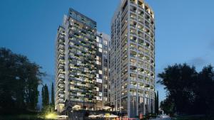 a tall building with many windows on a street at InterContinental Jerusalem by IHG in Jerusalem