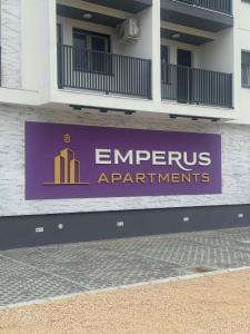 a sign on a building that reads emergency apartments at Aurora Lux Wellness & Spa in Veliko Gradište