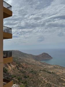 a view of the ocean from a building at Harmony immo in Bir el Djir