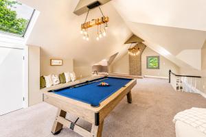 a room with a pool table in a house at Pool House Near NYC FIFA Stay for Groups in Roselle