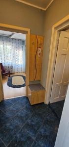 a room with a shower and a door and a floor at Casa Belu in Eforie Nord +31 photos