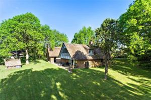 an old stone house with a grassy yard at FY175-Asperup-Sommerlandsvej-4 in Asperup