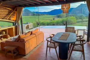 a living room with a couch and a table at Viento Blanco in Independencia
