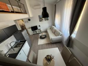 an overhead view of a living room with a couch at Downtown Apartments Pula in Pula